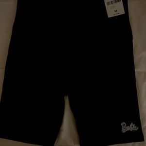 black ‘barbie’ biker shorts.